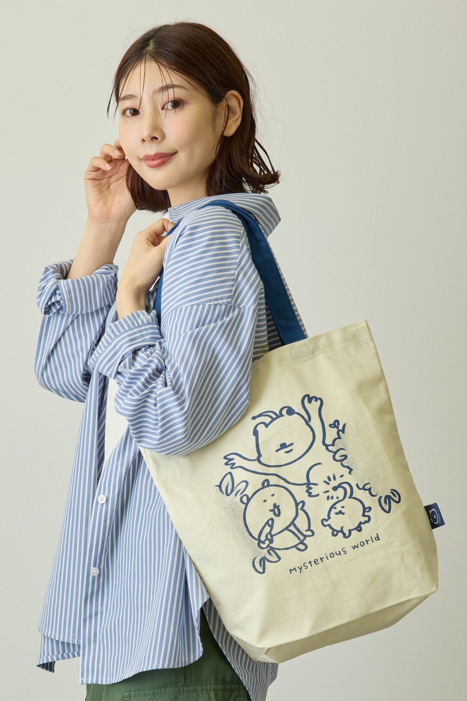 ナガノキャラクターズ トートバッグ 不思議な世界 ベージュ×ネイビー