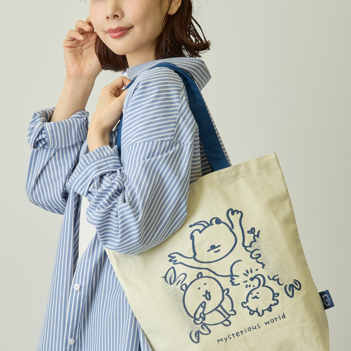 ナガノキャラクターズ トートバッグ 不思議な世界 ベージュ×ネイビー